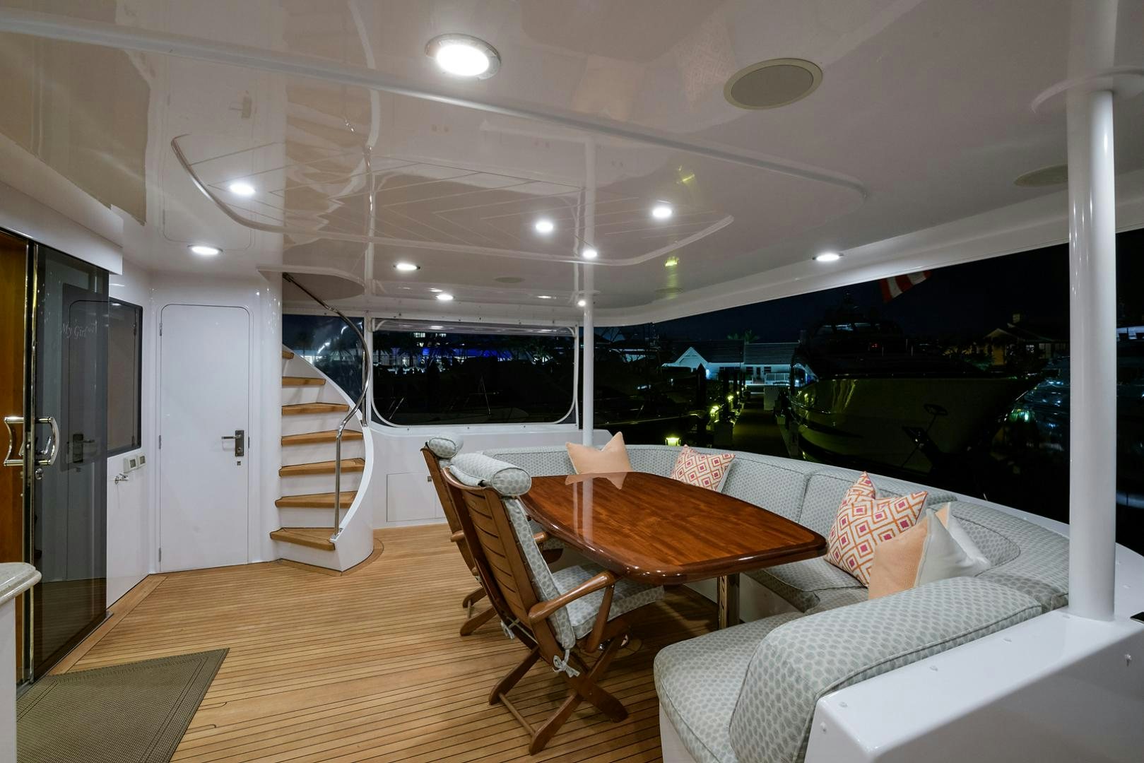 a room with a table and chairs aboard MY GIRL Yacht for Sale