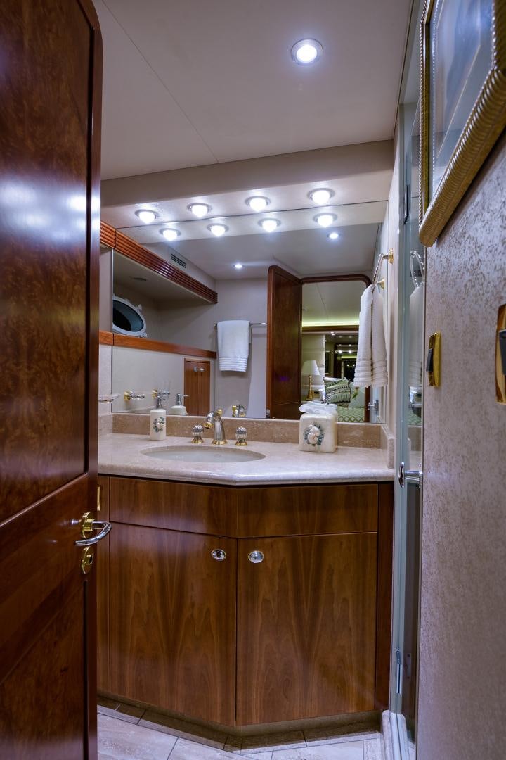 a bathroom with a sink and a mirror aboard MY GIRL Yacht for Sale