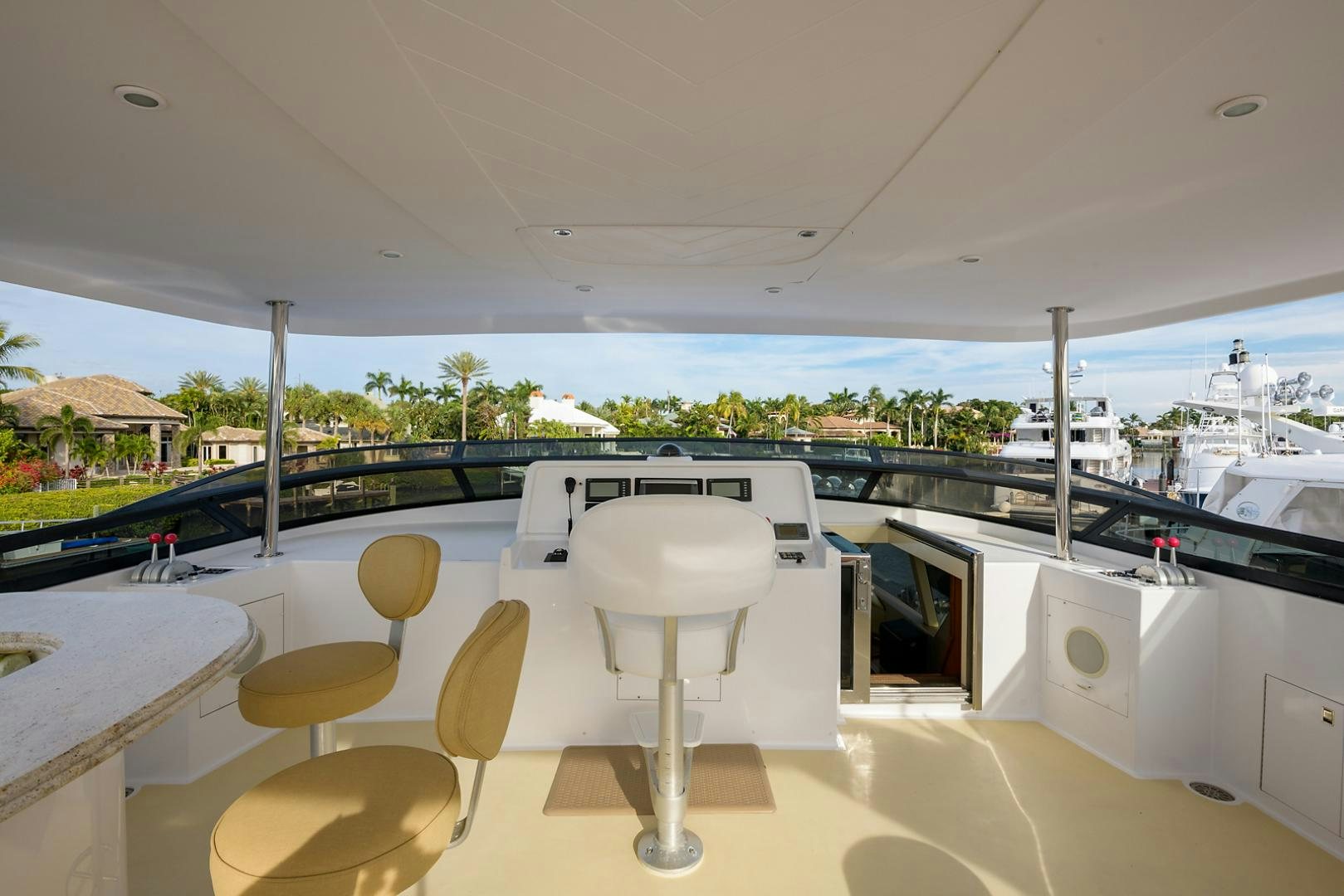 a room with a table and chairs aboard MY GIRL Yacht for Sale