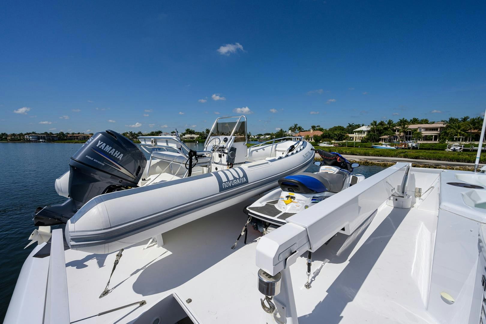 a boat with a motor attached to it aboard MY GIRL Yacht for Sale
