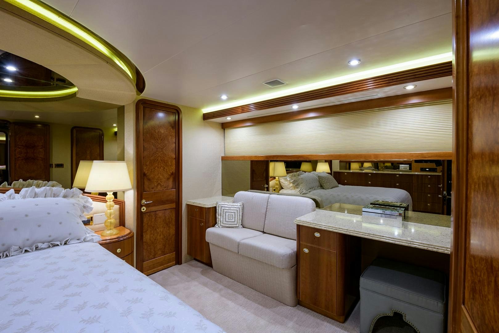 a room with a bed and a desk aboard MY GIRL Yacht for Sale