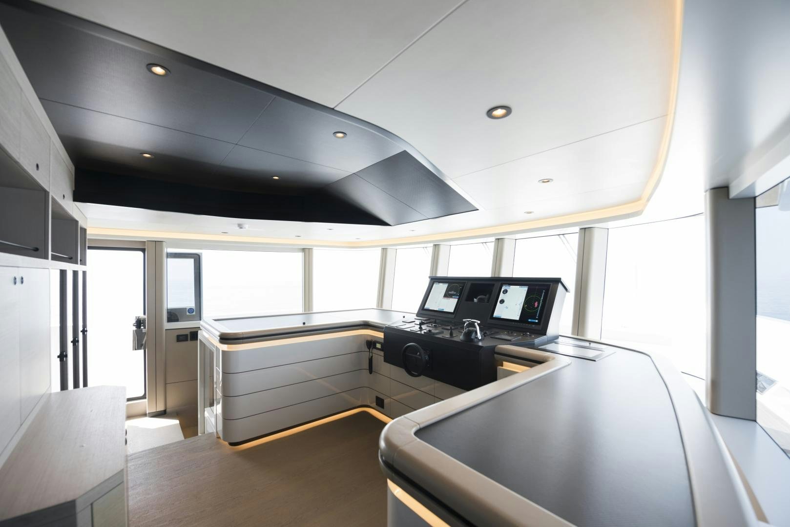 a room with a desk and a computer aboard ALFRESCO 125 Yacht for Sale