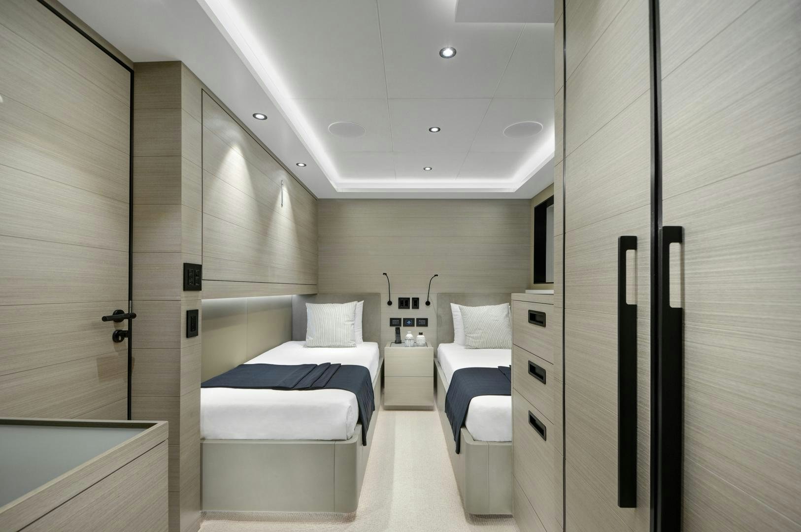 a room with a bed and a closet aboard ALFRESCO 125 Yacht for Sale