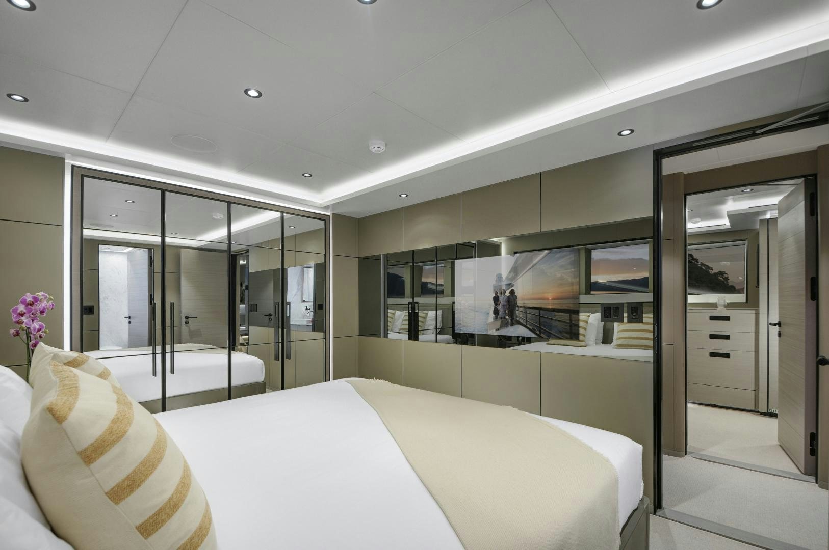 a room with a bed and a glass wall aboard ALFRESCO 125 Yacht for Sale