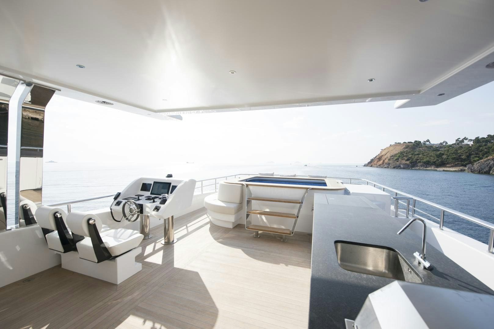 a room with a pool table and chairs aboard ALFRESCO 125 Yacht for Sale