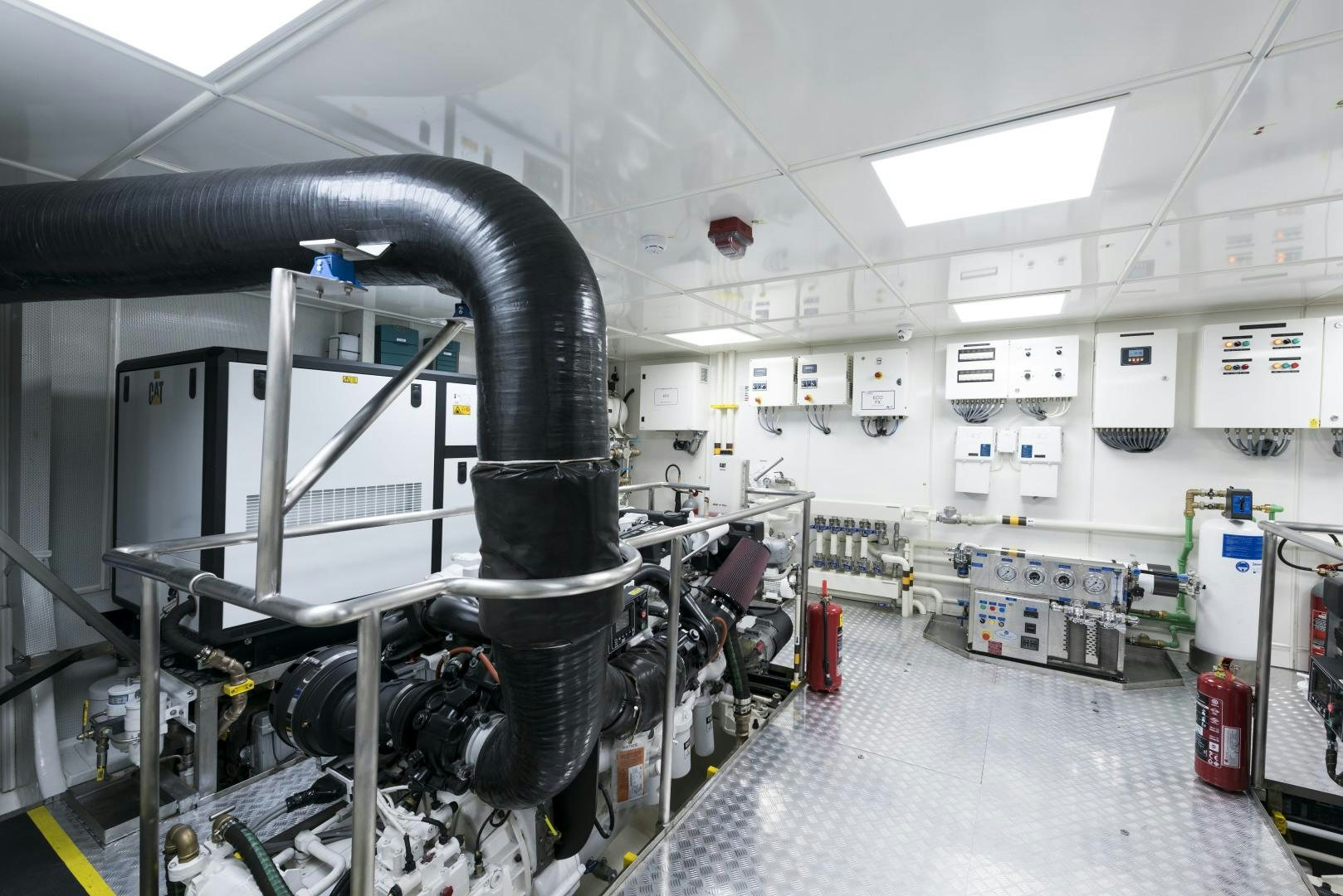 a large machine in a factory aboard ALFRESCO 125 Yacht for Sale