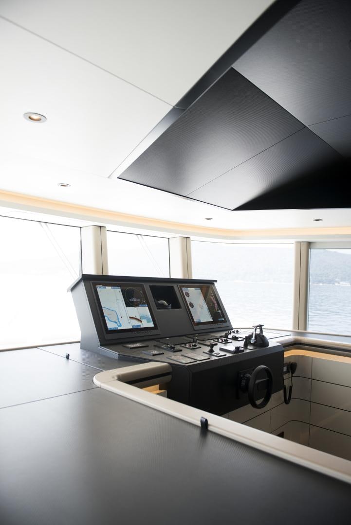a laptop on a counter aboard ALFRESCO 125 Yacht for Sale