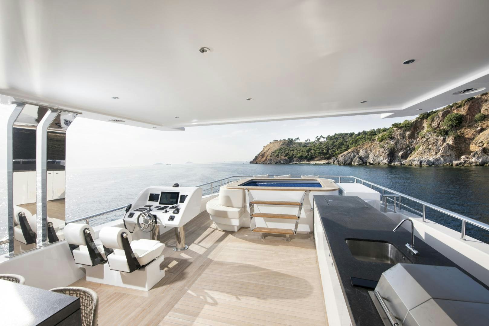 a boat on the water aboard ALFRESCO 125 Yacht for Sale