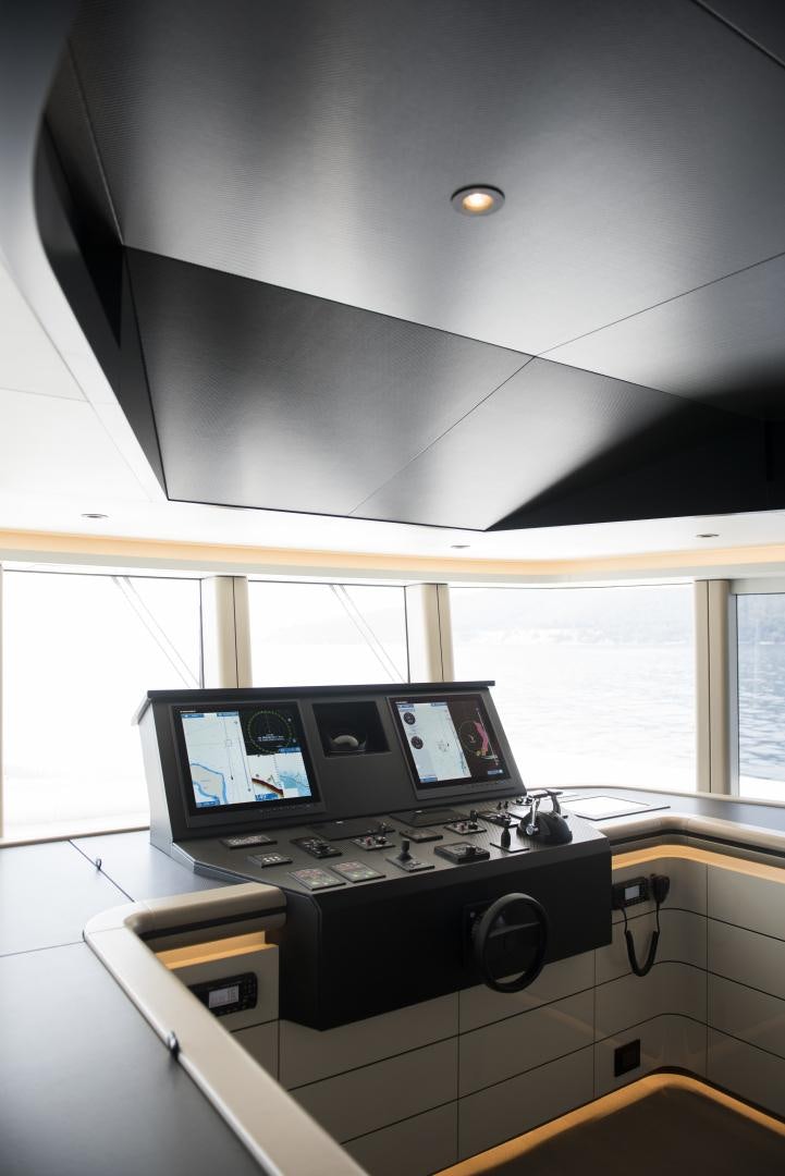 a room with a couple of monitors and a keyboard aboard ALFRESCO 125 Yacht for Sale