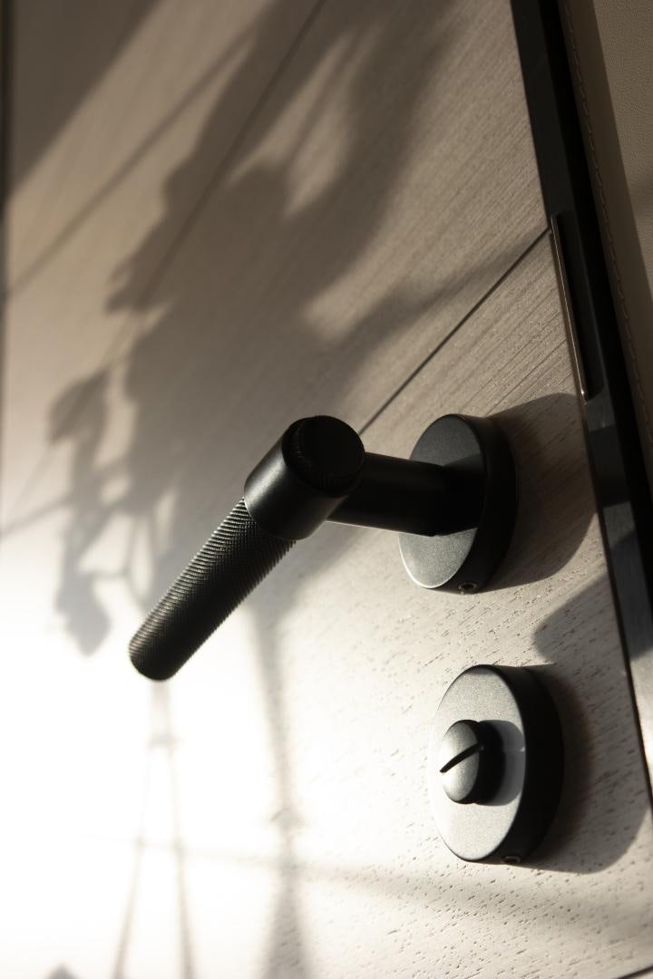 a close-up of a door handle aboard ALFRESCO 125 Yacht for Sale