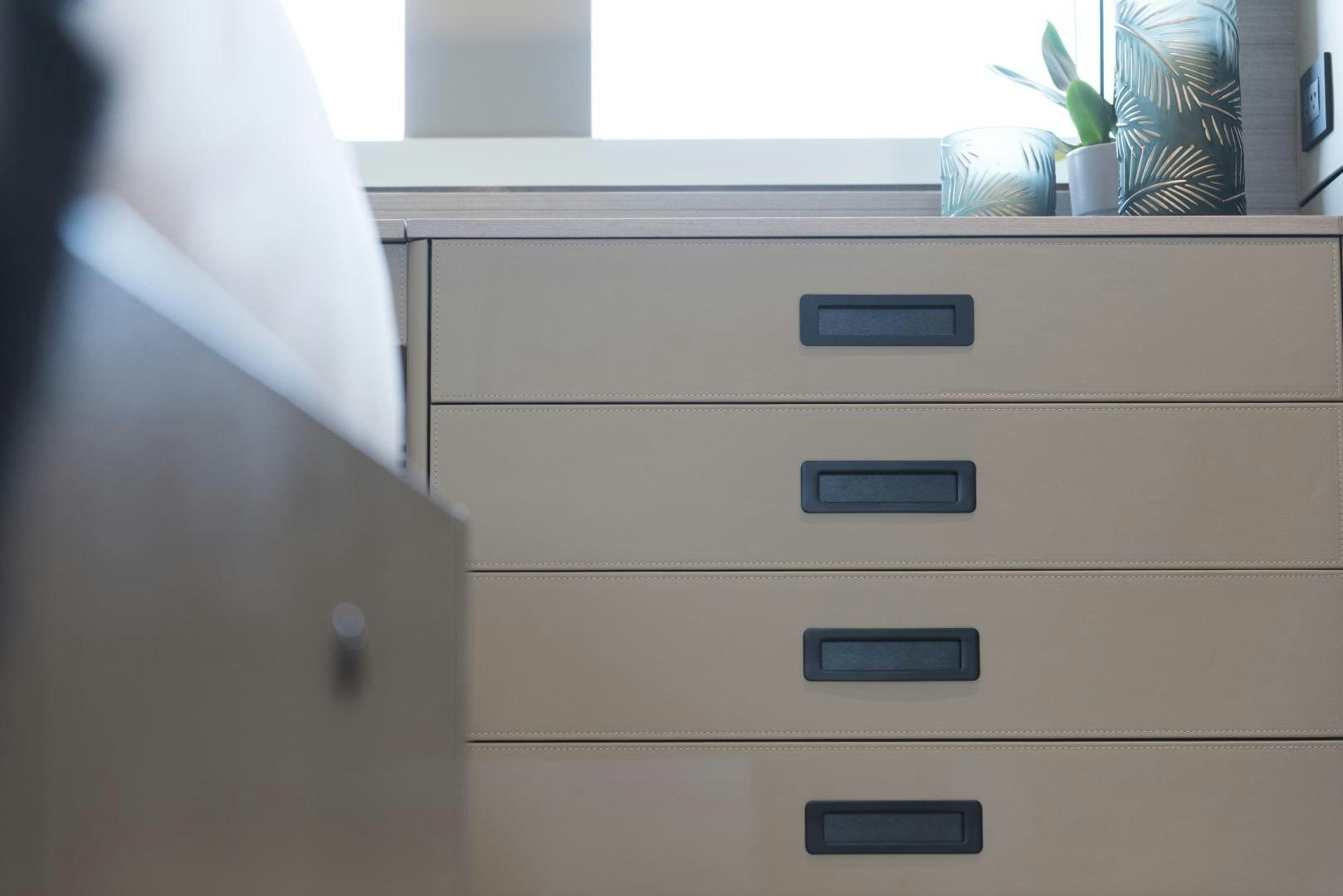 a dresser with drawers aboard ALFRESCO 125 Yacht for Sale