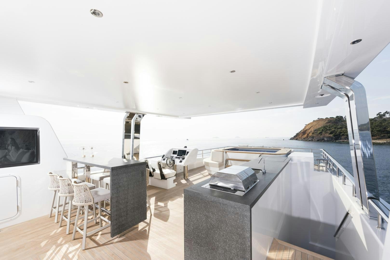 a boat on the water aboard ALFRESCO 125 Yacht for Sale