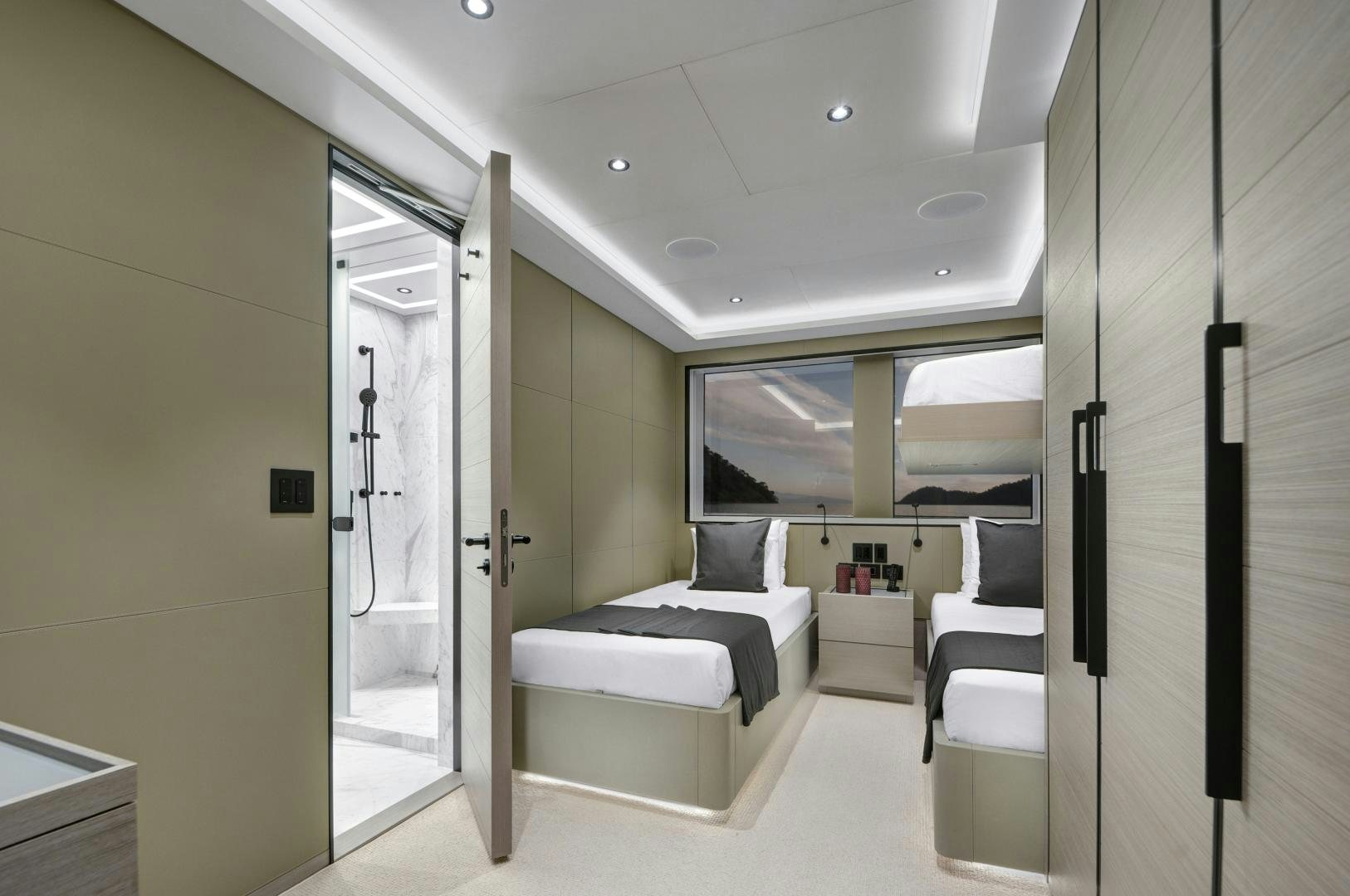 a room with a bed and a desk aboard ALFRESCO 125 Yacht for Sale