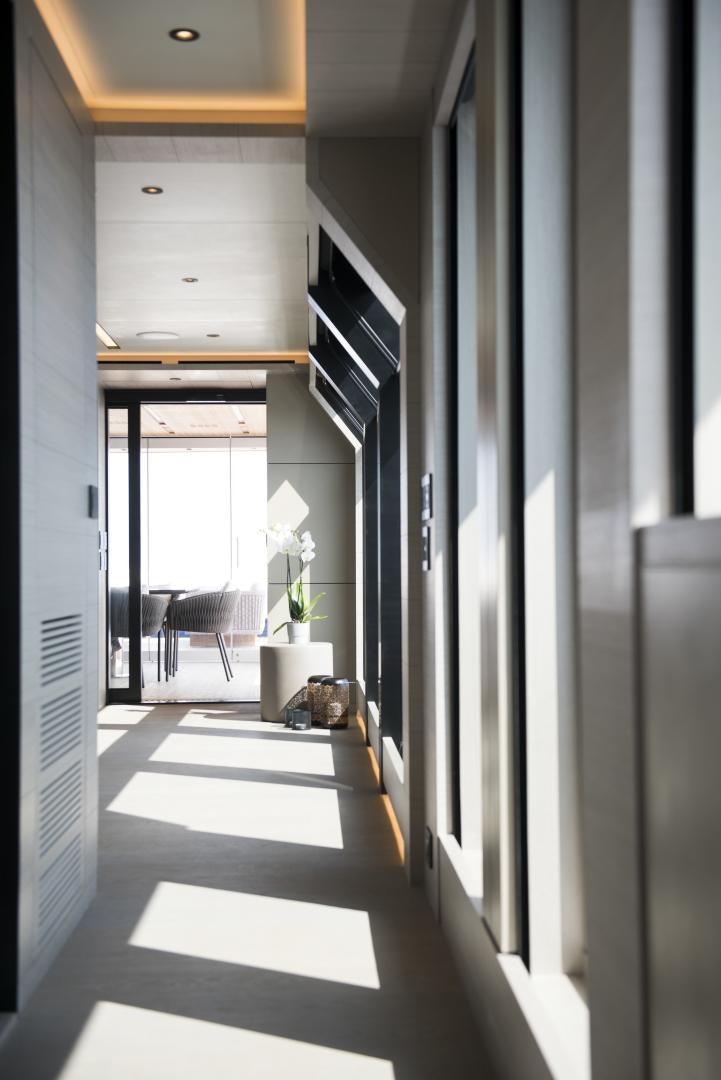 a hallway with a black and white floor and a black and white wall aboard ALFRESCO 125 Yacht for Sale