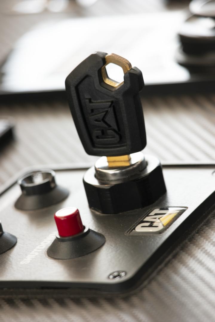 a black and silver headphones on a table aboard ALFRESCO 125 Yacht for Sale