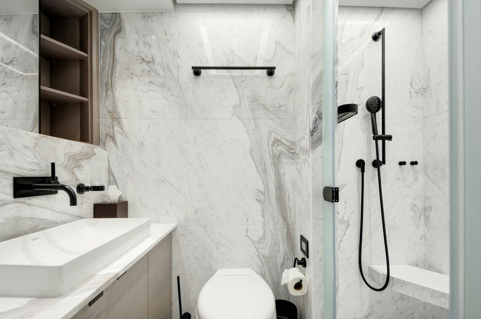 a bathroom with a sink and toilet aboard ALFRESCO 125 Yacht for Sale