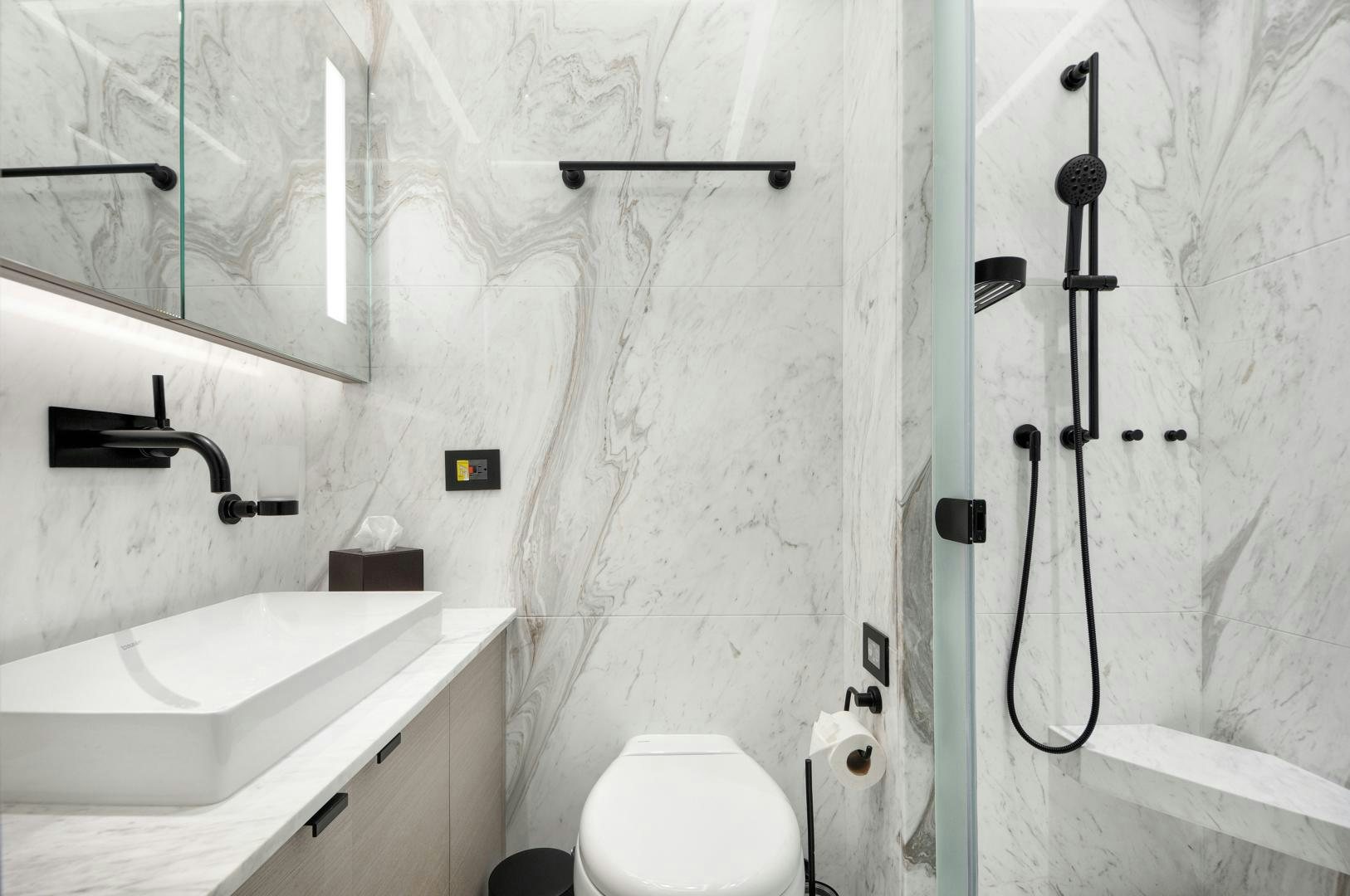 a bathroom with a sink and toilet aboard ALFRESCO 125 Yacht for Sale