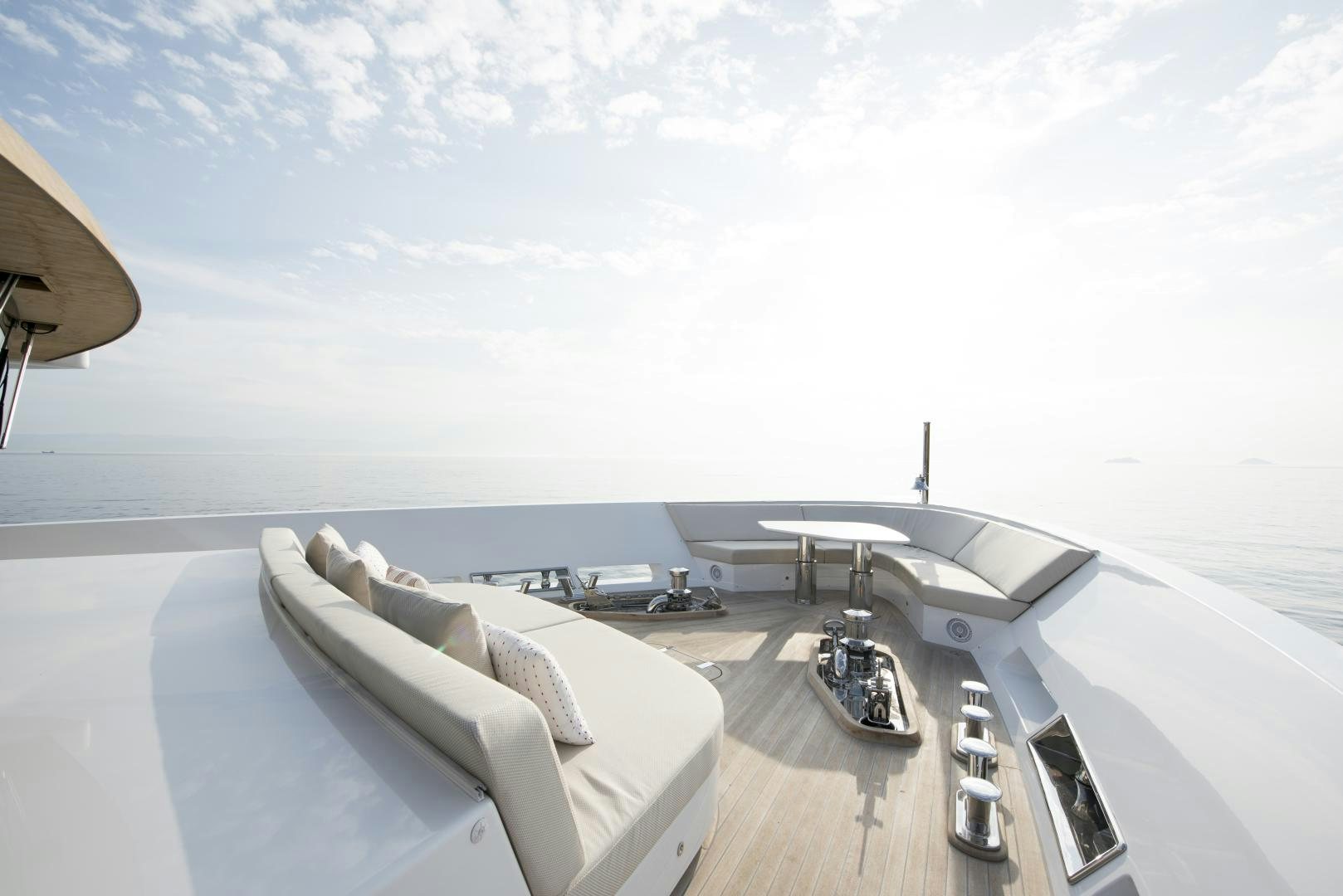 a room with a couch and a table and a chair aboard ALFRESCO 125 Yacht for Sale