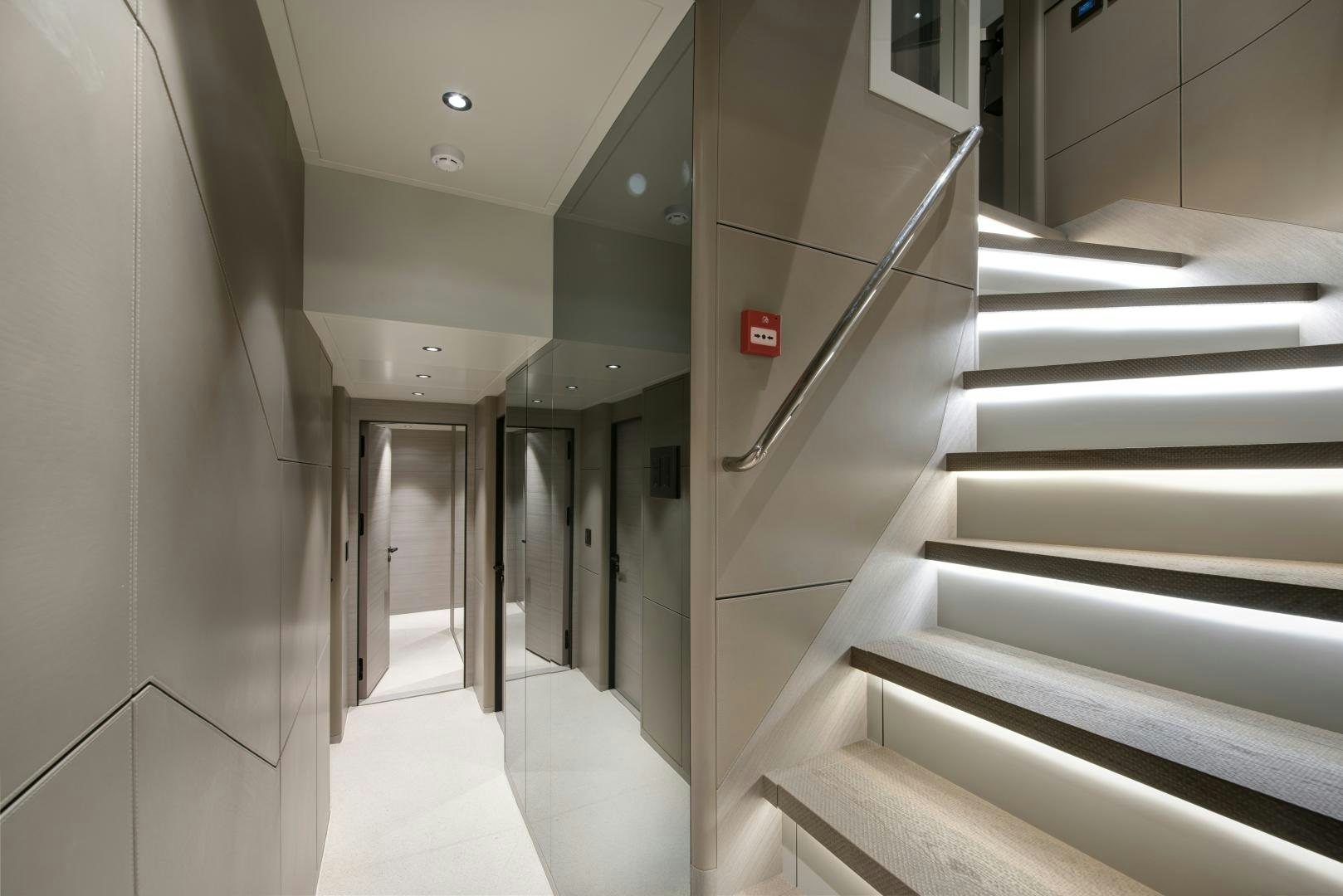 a hallway with white walls aboard ALFRESCO 125 Yacht for Sale