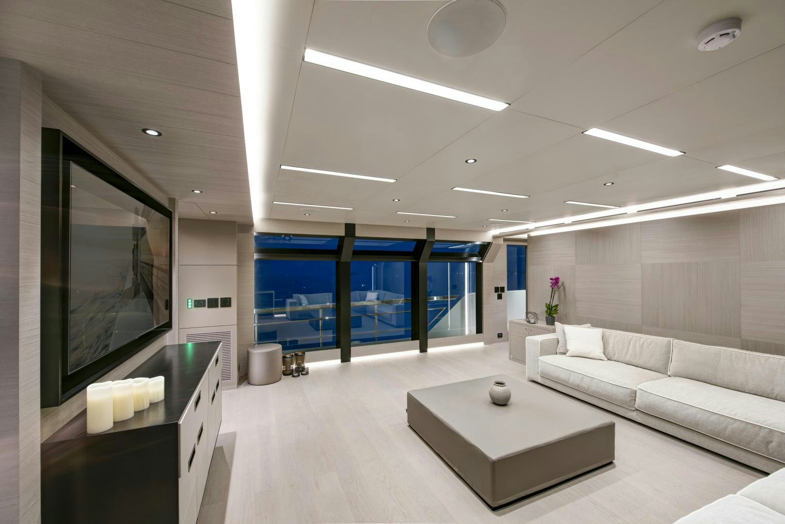 a room with a couch and a tv aboard ALFRESCO 125 Yacht for Sale