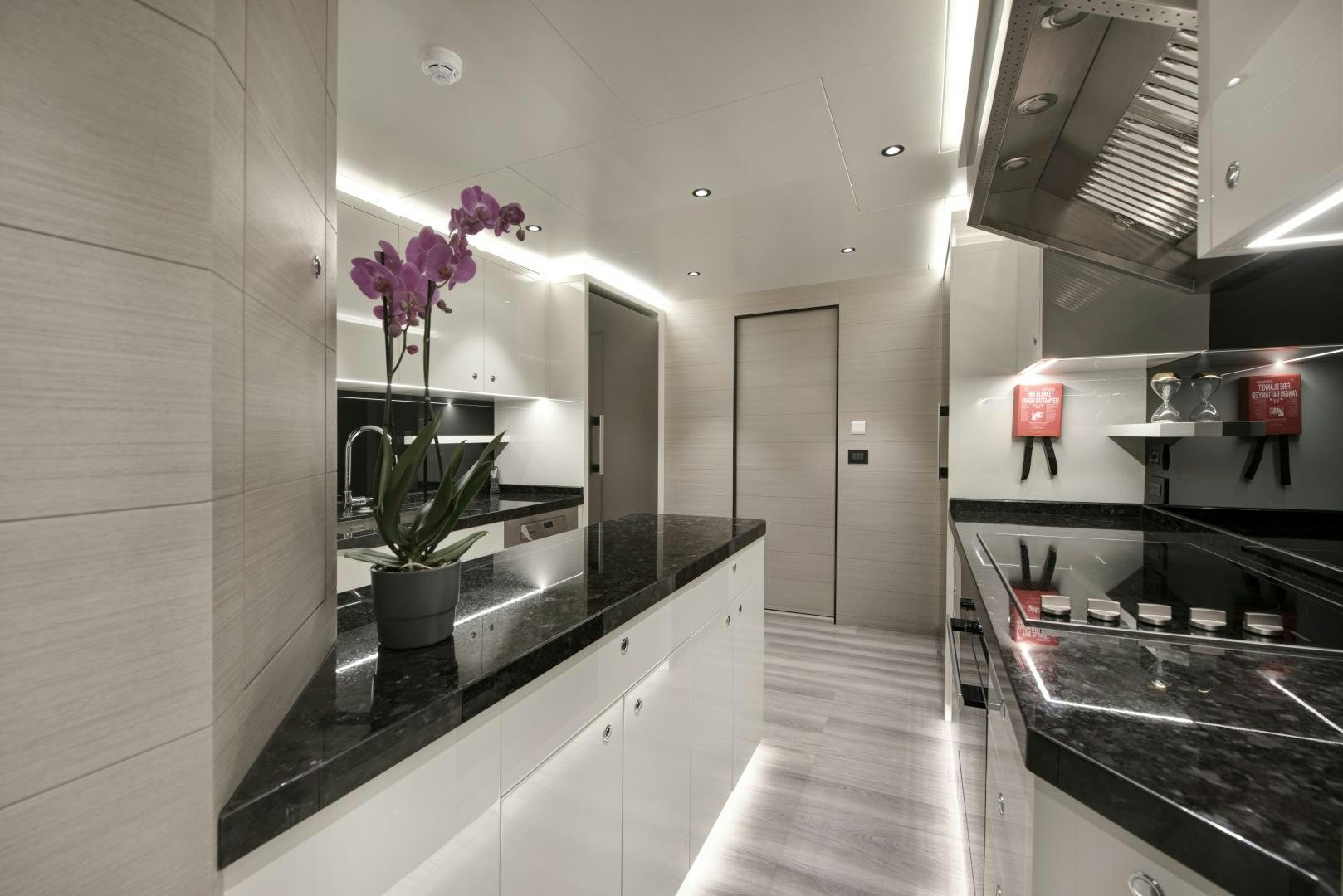 a kitchen with a countertop aboard ALFRESCO 125 Yacht for Sale