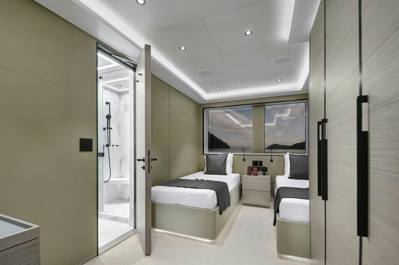 a room with a bed and a desk aboard ALFRESCO 125 Yacht for Sale