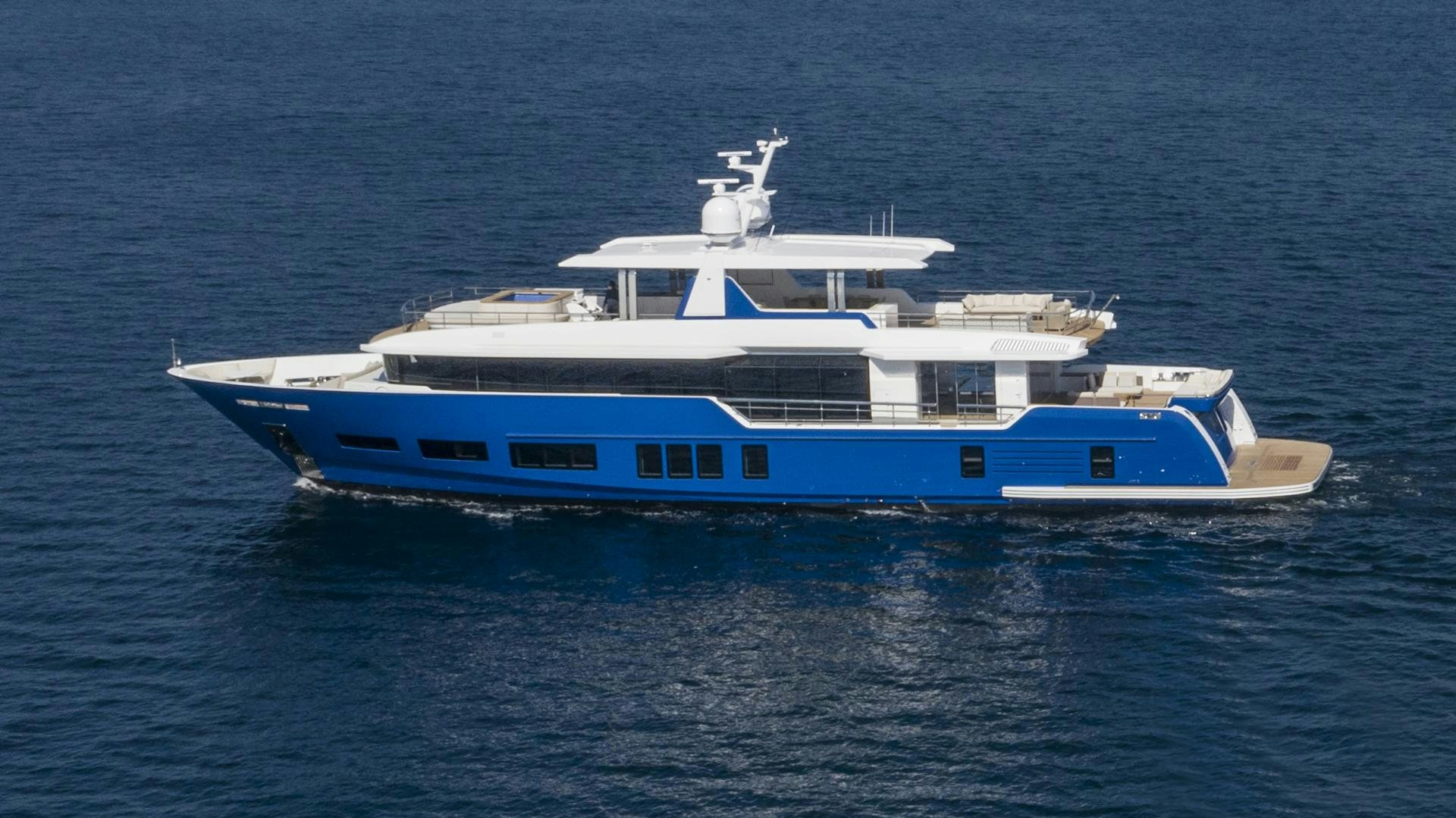 a large white boat in the water aboard ALFRESCO 125 Yacht for Sale