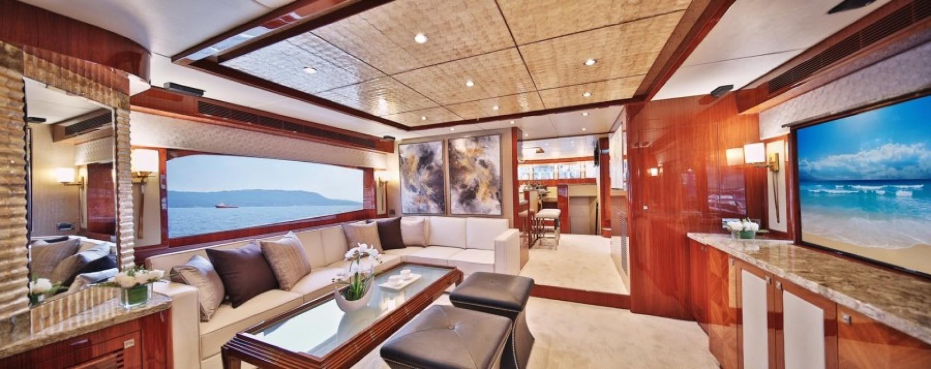 a room with a large window and a large television aboard JOHNSON 80' FLYBRIDGE W/FISHING COCKPIT Yacht for Sale