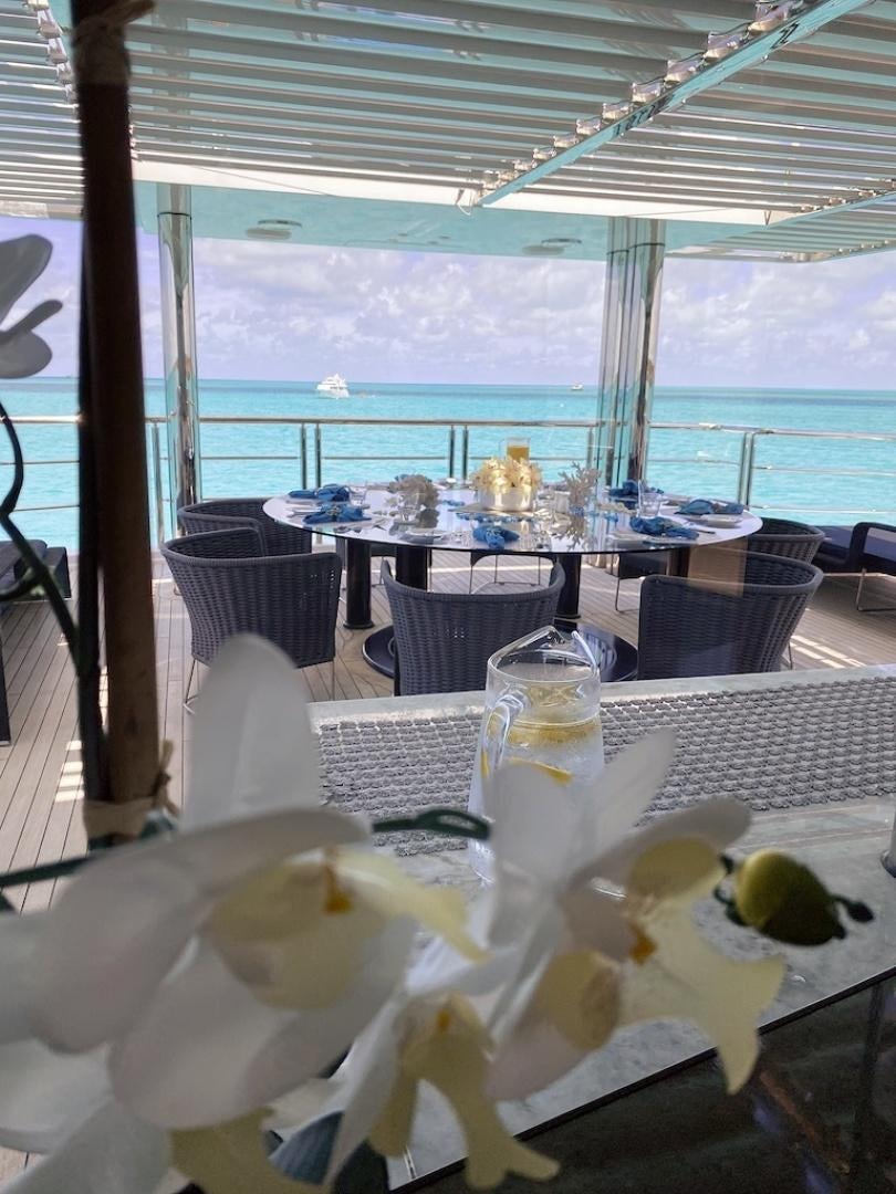 a table with food on it aboard OCULUS Yacht for Sale