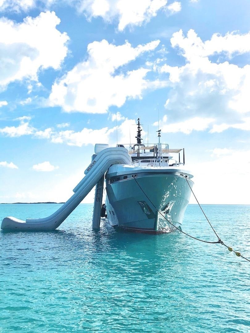 a large whale tail coming out of the water aboard OCULUS Yacht for Sale