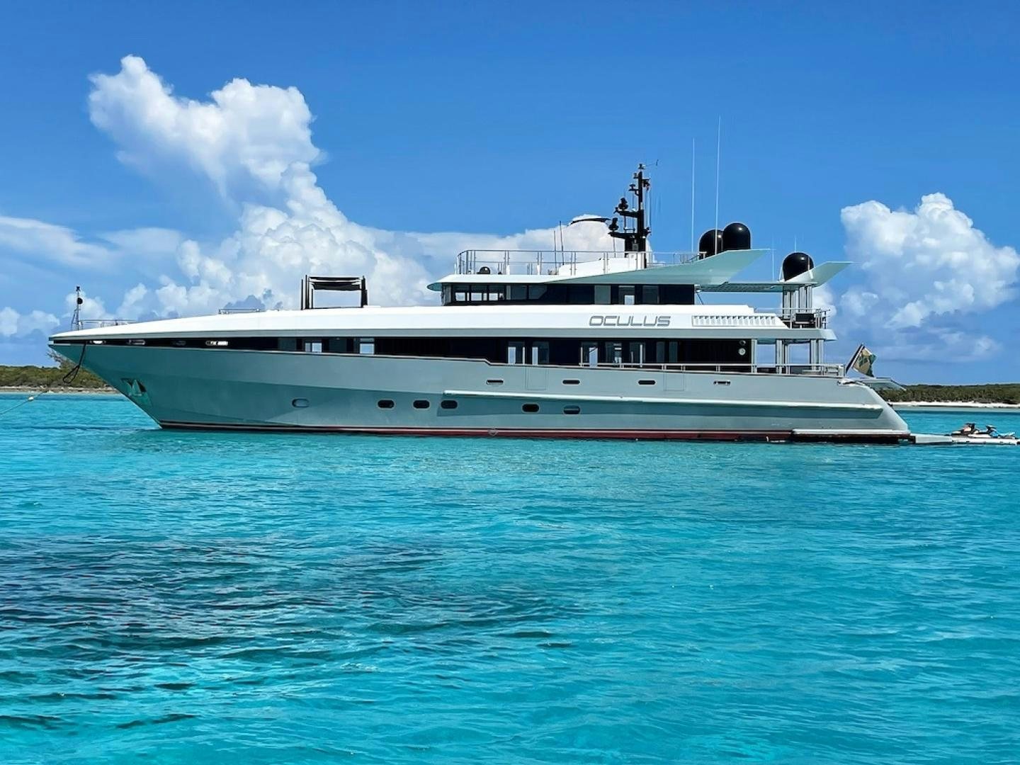 a large white ship in the water aboard OCULUS Yacht for Sale
