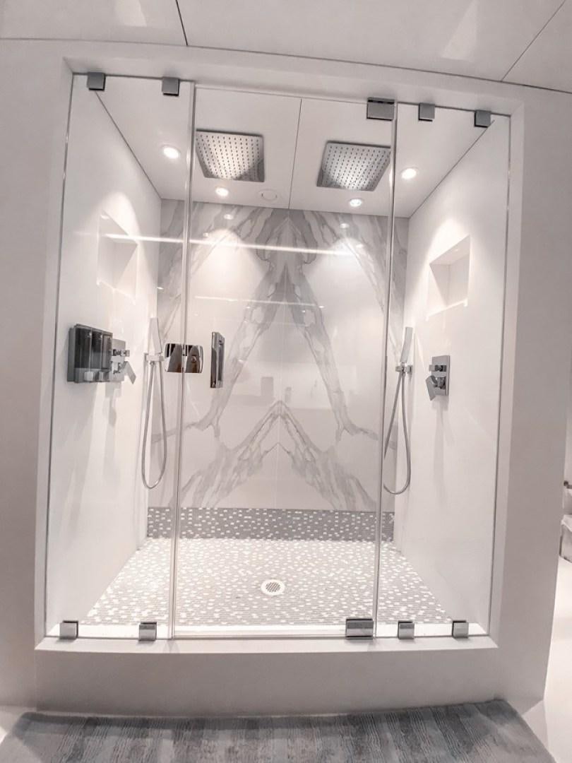 a shower unit with a mirror aboard OCULUS Yacht for Sale