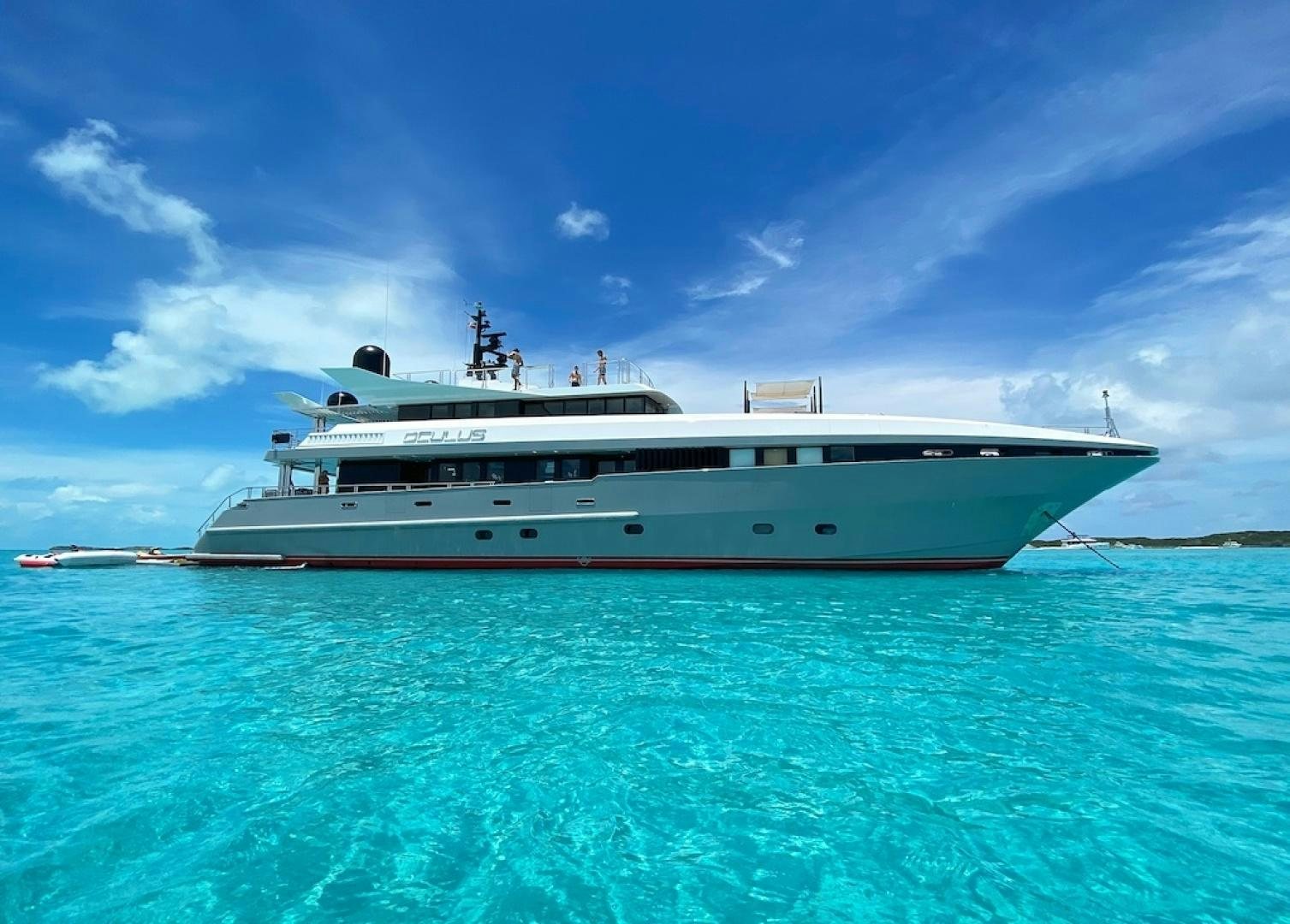 a large white boat in the water aboard OCULUS Yacht for Sale