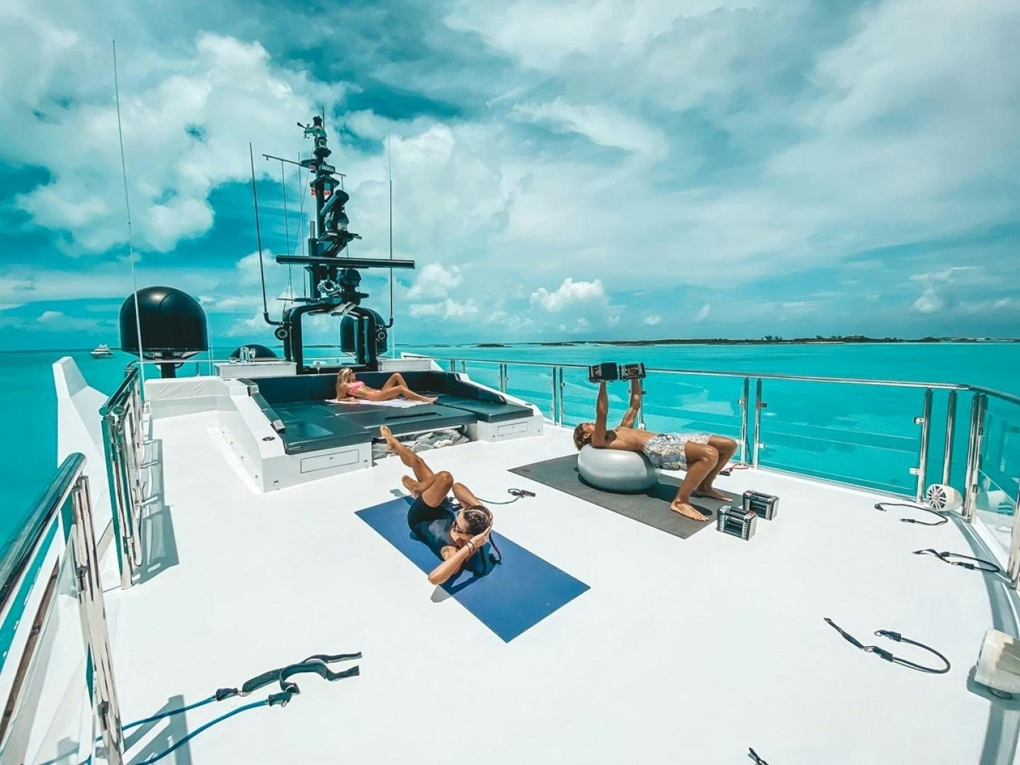 a group of people on a boat aboard OCULUS Yacht for Sale