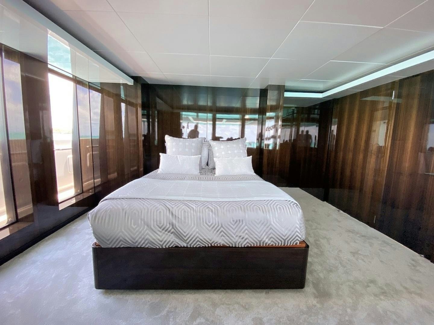 a bed in a room aboard OCULUS Yacht for Sale