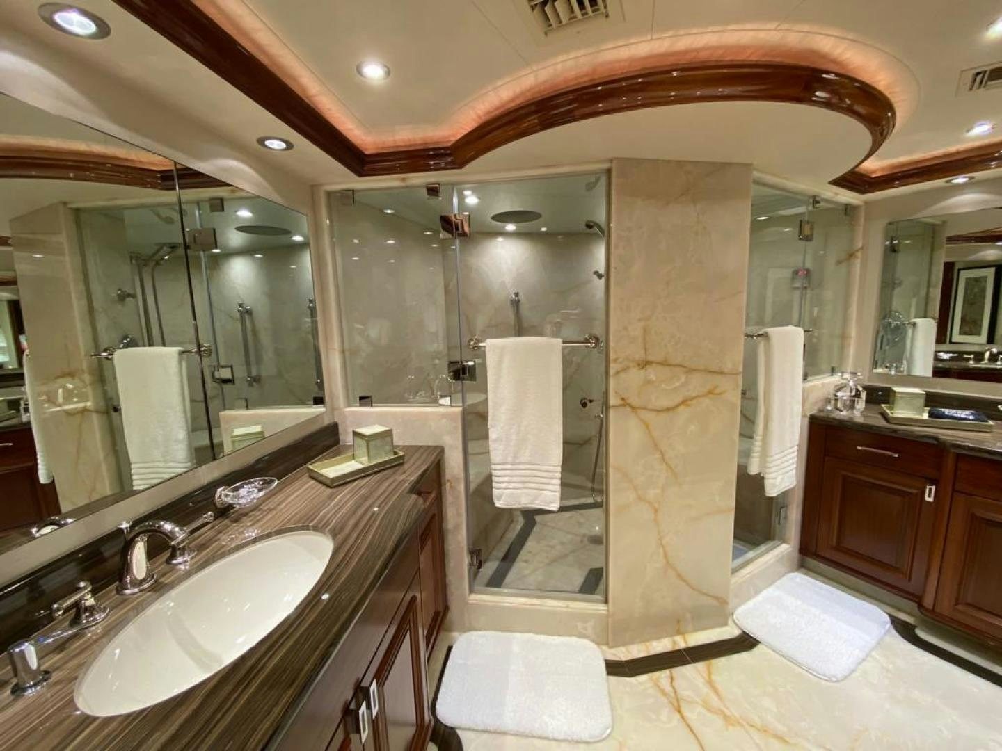 a bathroom with a large mirror aboard YES Yacht for Sale