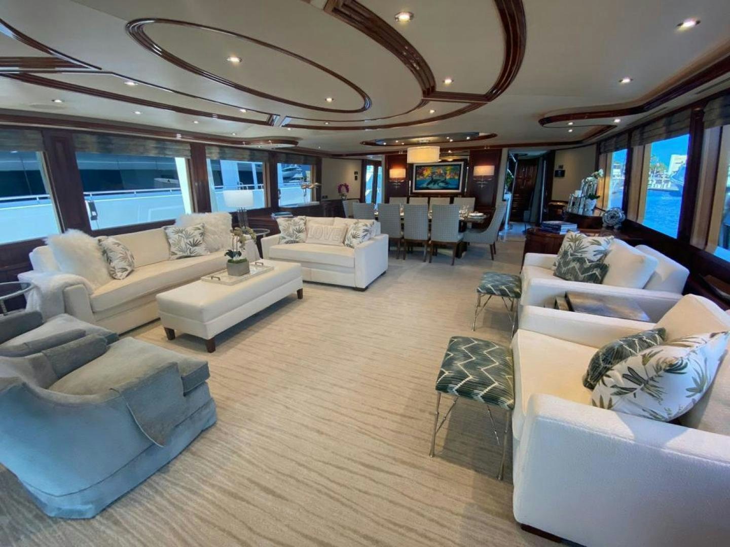a living room with a large window aboard YES Yacht for Sale