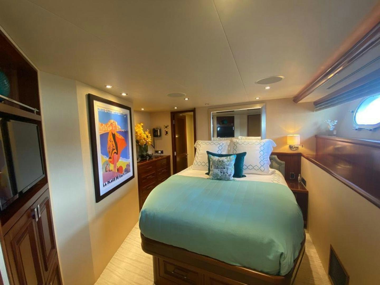 a bed in a room aboard YES Yacht for Sale