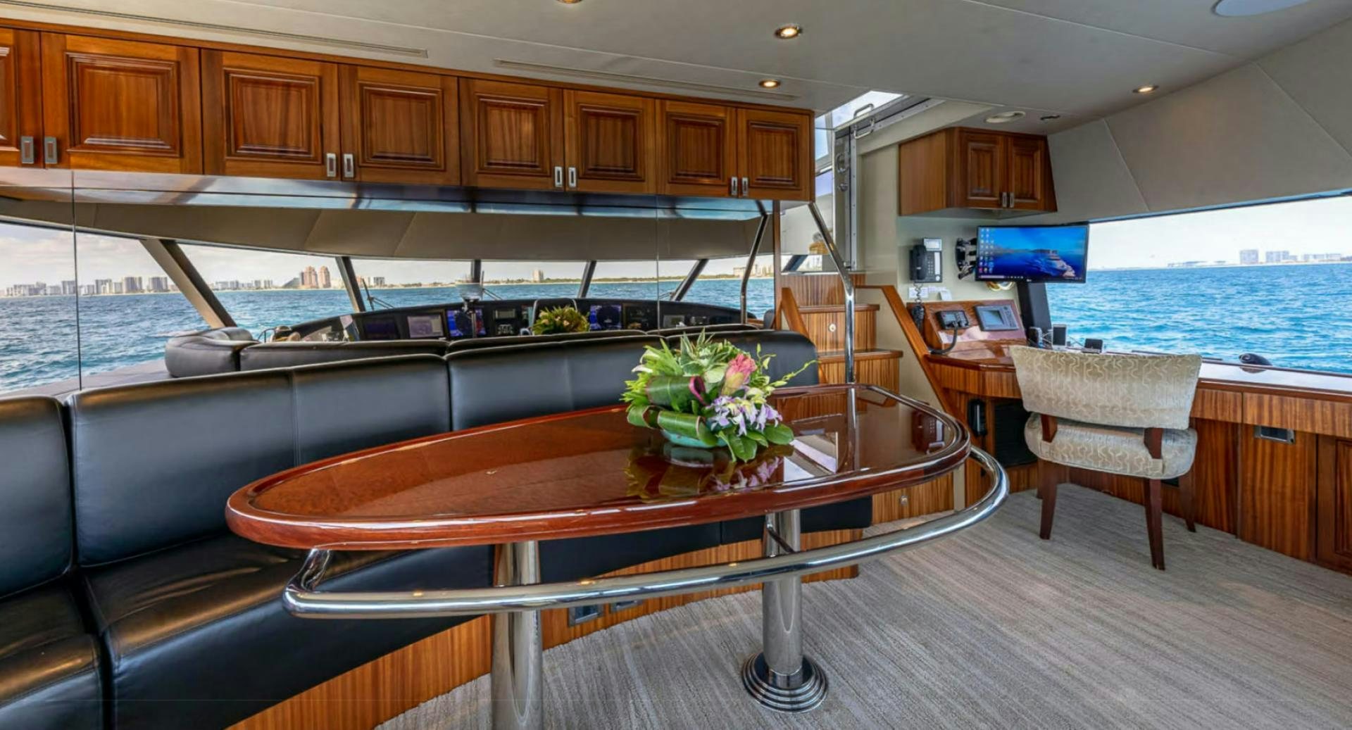 a large kitchen with a pool table aboard YES Yacht for Sale