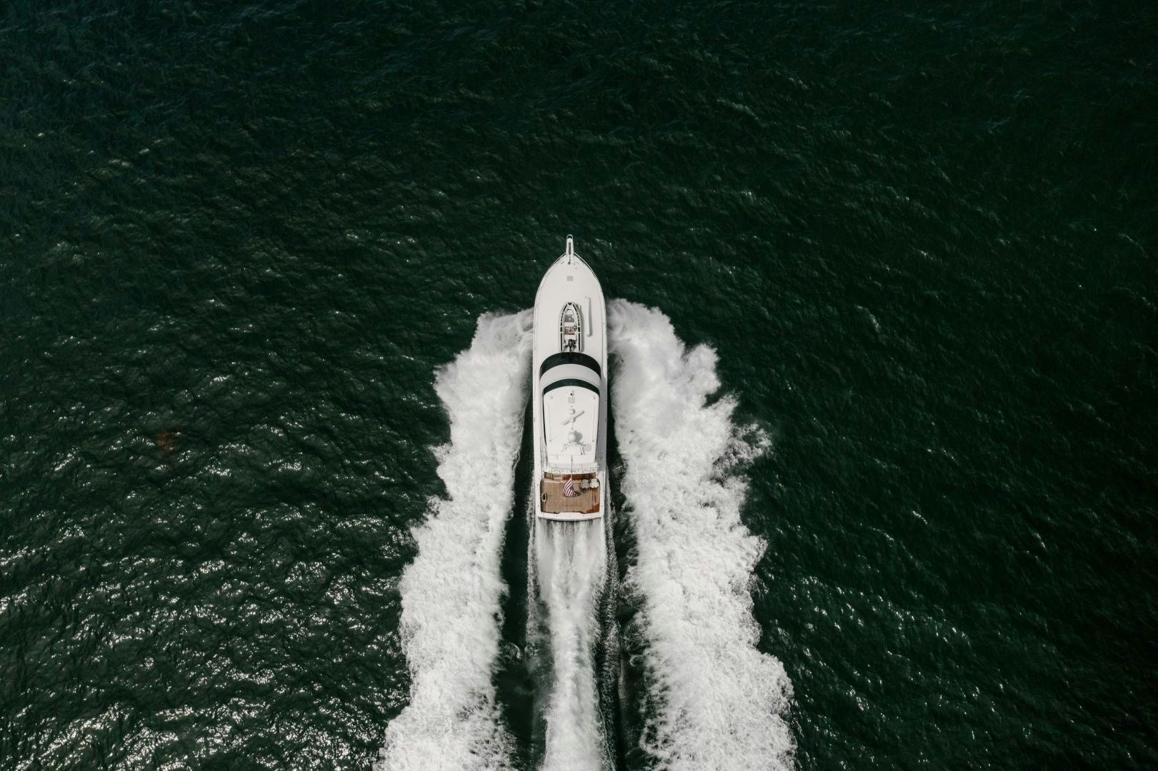 a rocket taking off from the ocean aboard KICKBACK Yacht for Sale