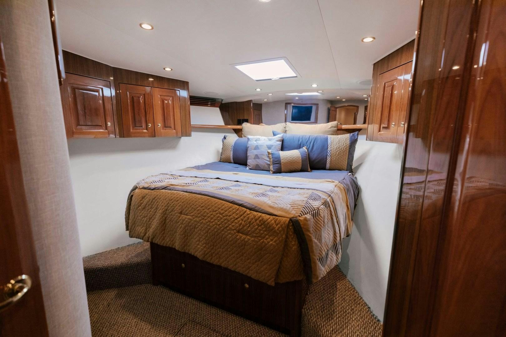 a bed in a room aboard KICKBACK Yacht for Sale