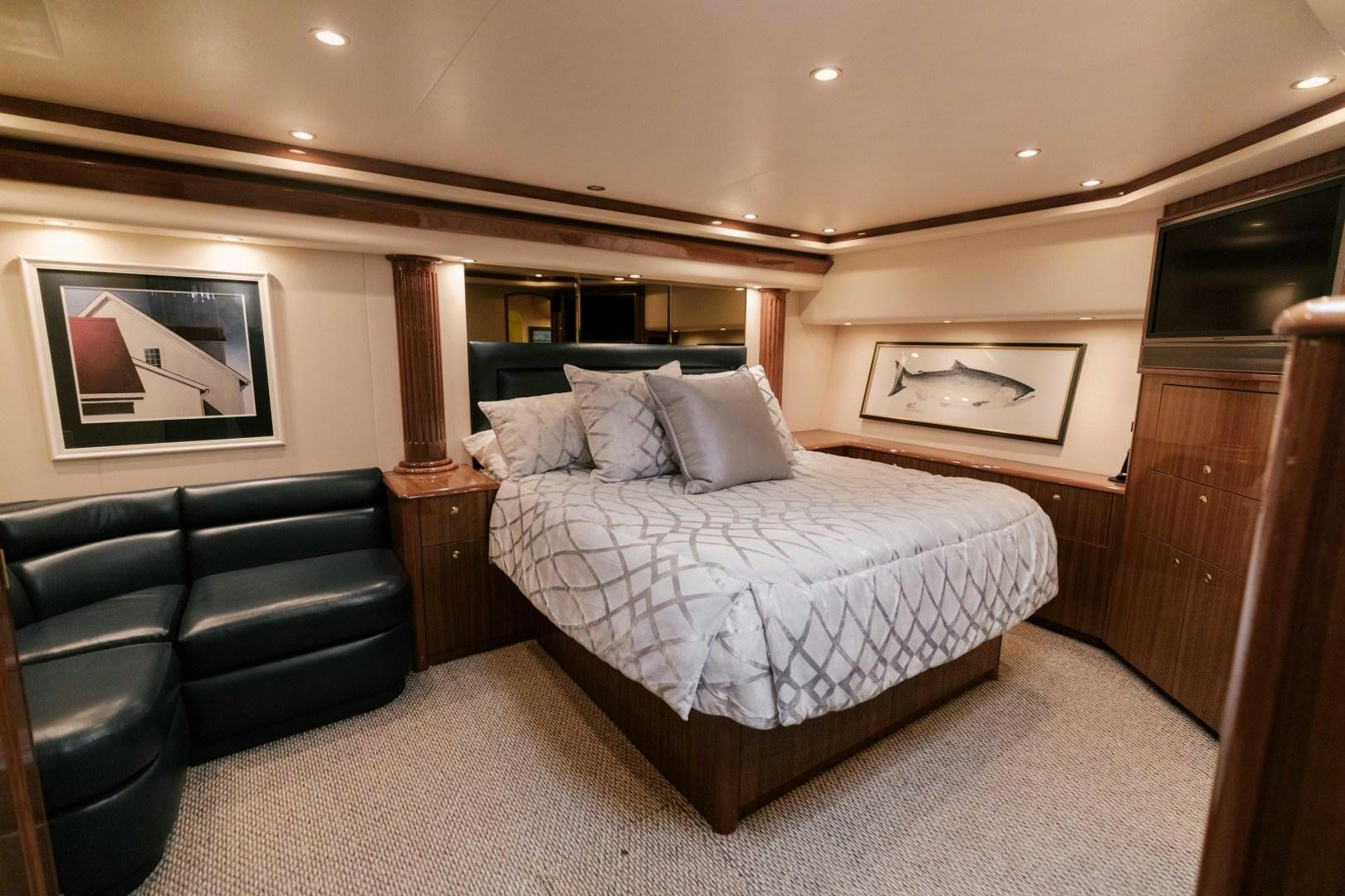 a bed in a hotel room aboard KICKBACK Yacht for Sale