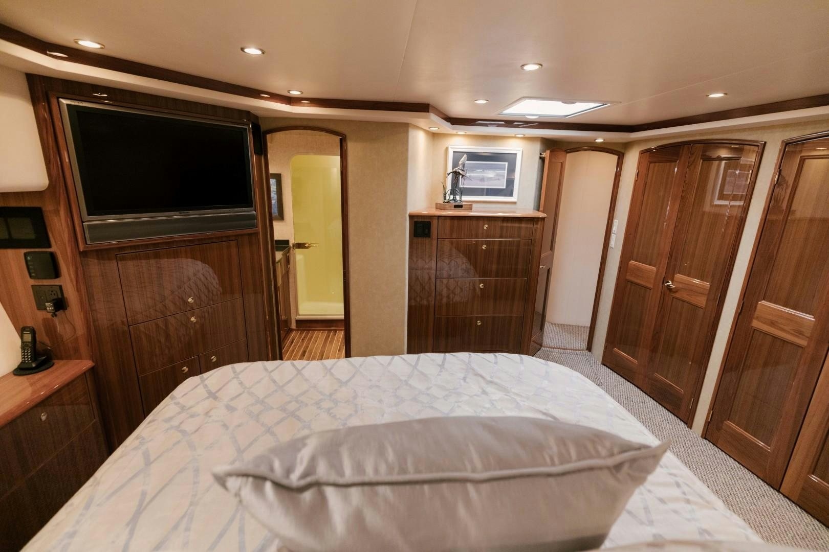 a hotel room with a bed aboard KICKBACK Yacht for Sale