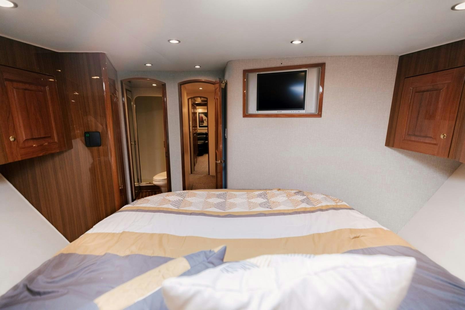 a hotel room with a bed aboard KICKBACK Yacht for Sale