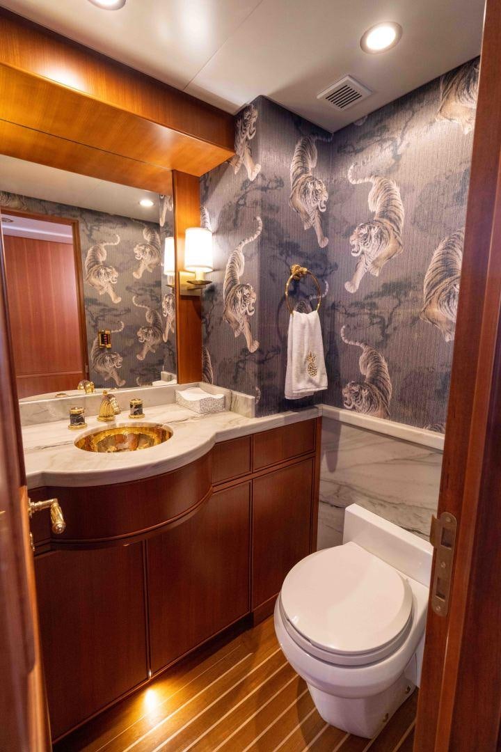 a bathroom with a sink and toilet aboard NEREUS Yacht for Sale
