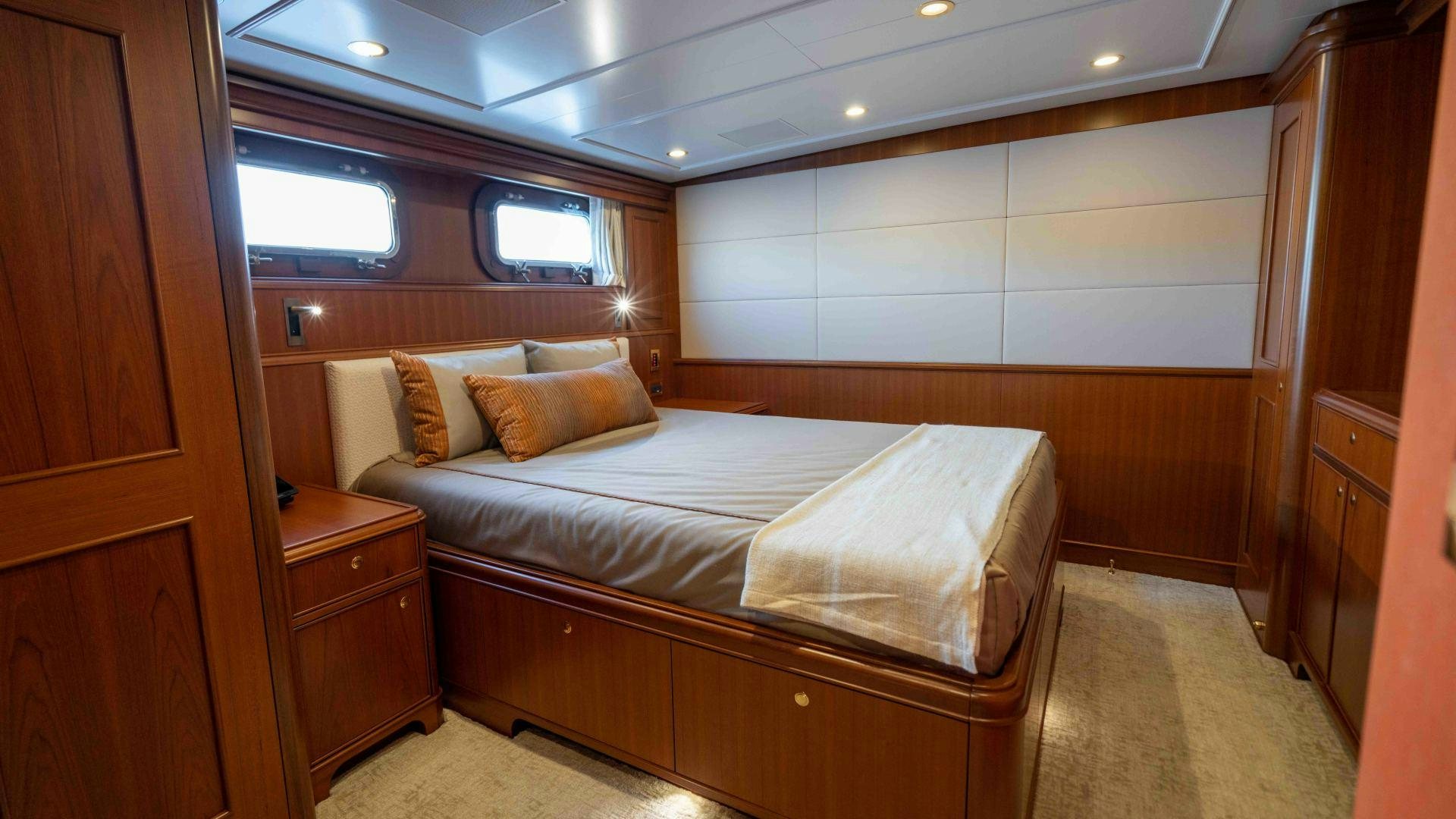 a bed in a room aboard NEREUS Yacht for Sale