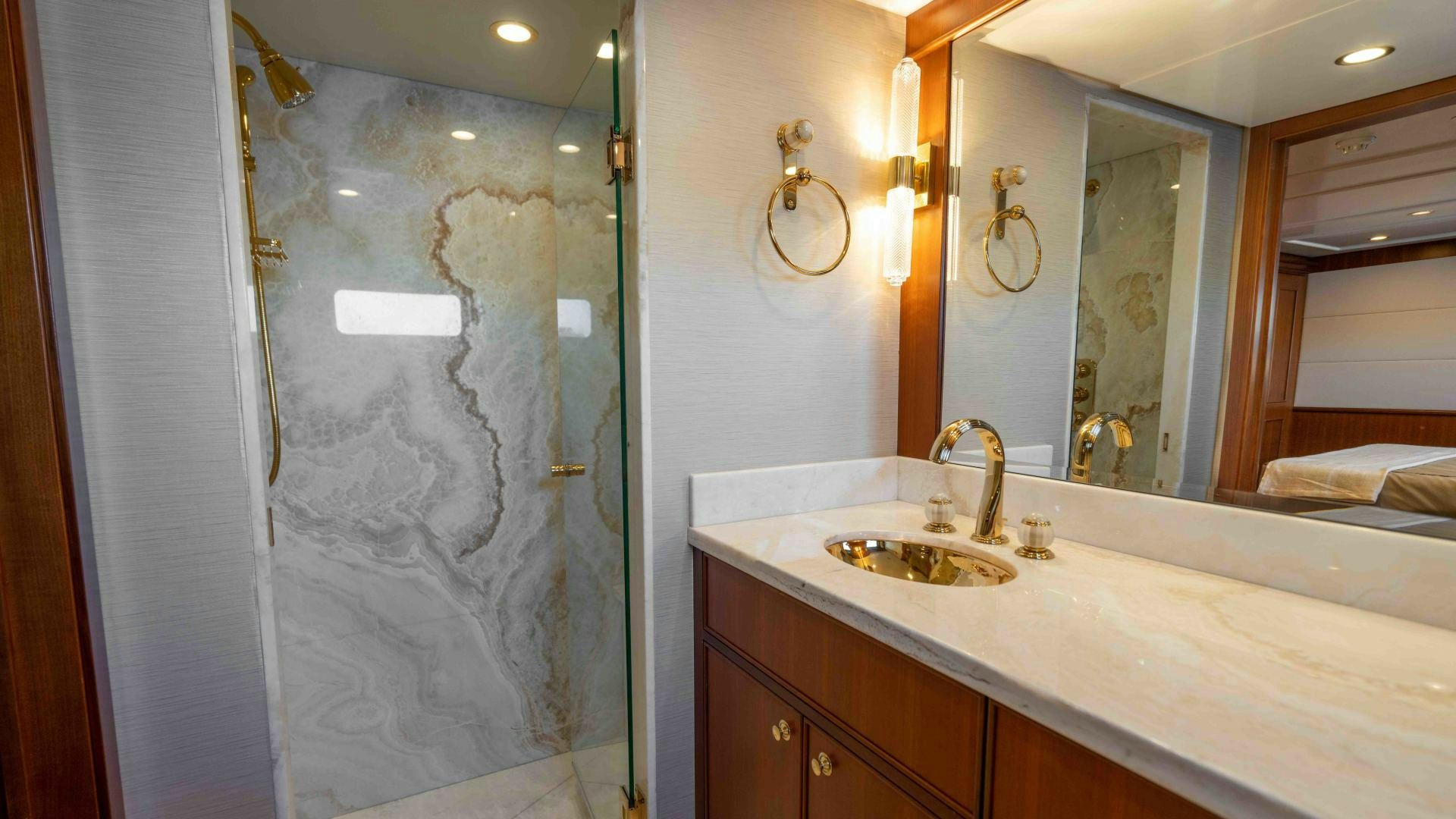 a bathroom with a glass shower aboard NEREUS Yacht for Sale