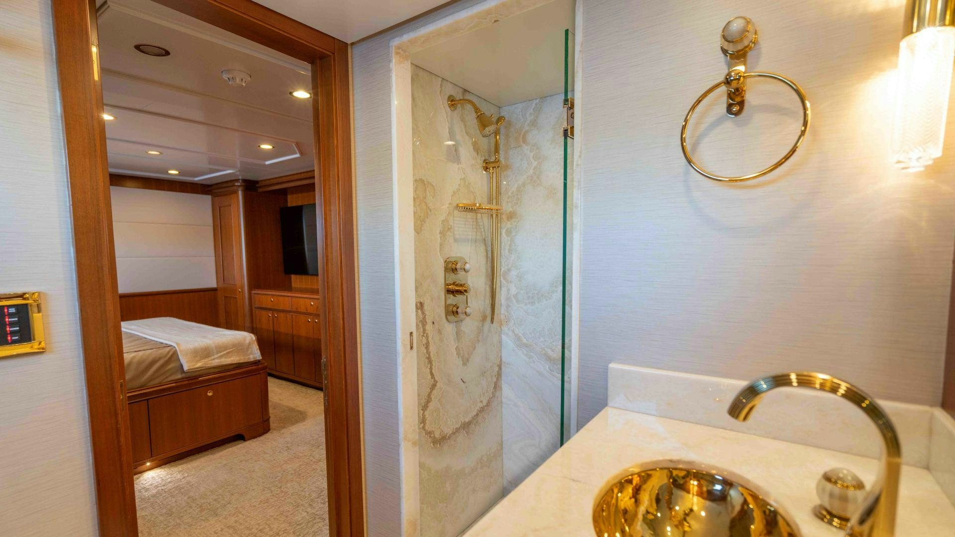 a bathroom with a sink and a mirror aboard NEREUS Yacht for Sale