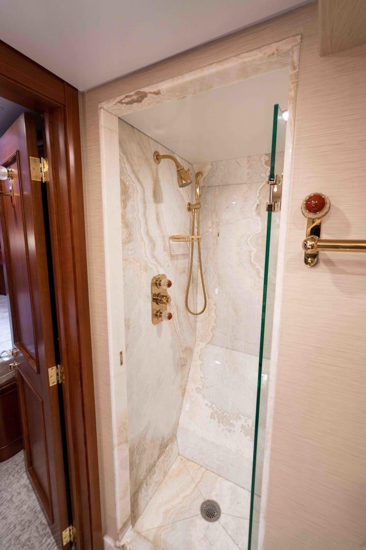 a shower with a glass door aboard NEREUS Yacht for Sale