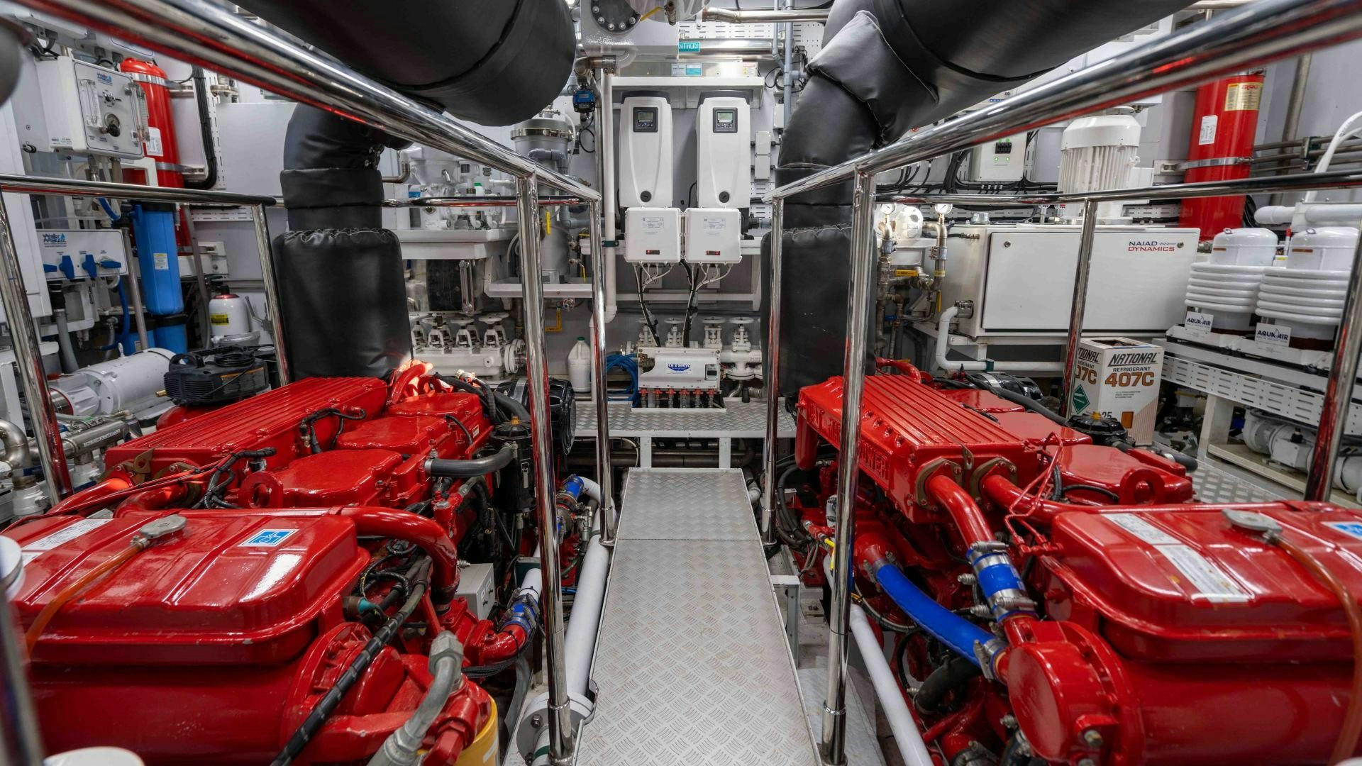 a large factory with red machinery aboard NEREUS Yacht for Sale
